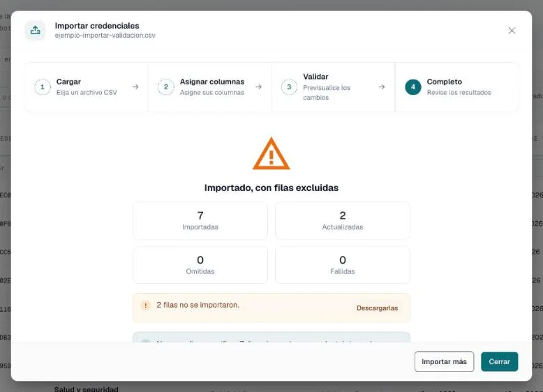 Pantalla de fin de importación con los recuentos y un enlace para descargar las filas omitidas