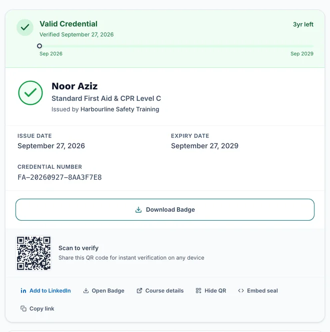 Verify page for a credential with a photo: the record is confirmed, with no Download Credential button